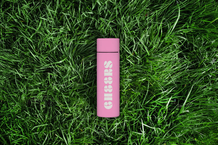 Stainless steel Cheers Flask by soiree-sisters with a sleek, modern design and screw-top lid for portable drink storage.