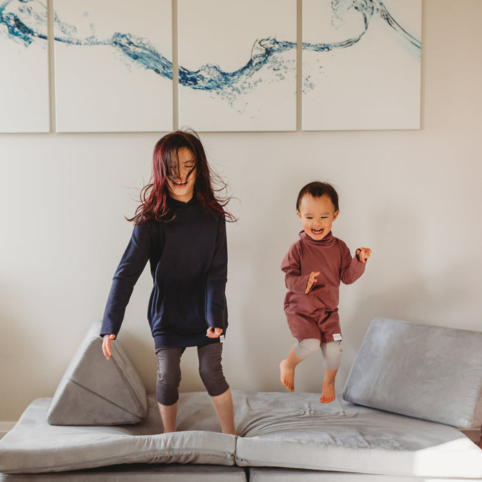 Eco-friendly kids' clothing โ gender-neutral Rose Brown grow with me turtleneck, sustainably made in Canada.