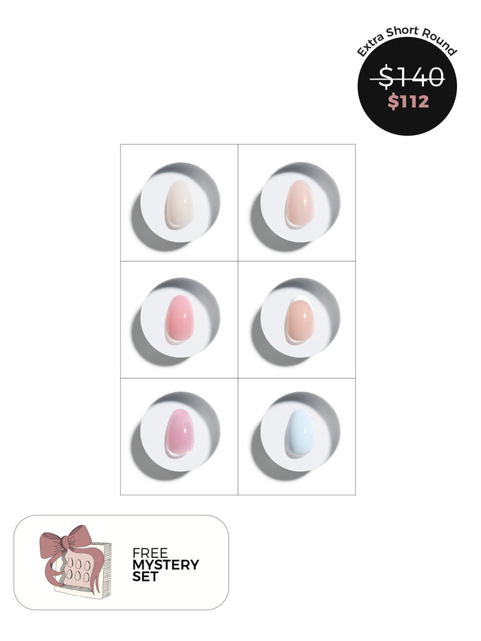 Product display with six extra short round press-on nail samples and a price tag on a white background