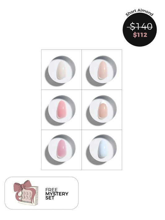 Short almond press-on nails with six colors displayed on a white background, including a free mystery set offer.