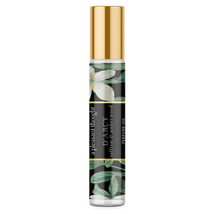 A Pleasant Thought D'ARCY perfume oil with saffron and amberwood, featuring a sleek glass bottle and elegant design.