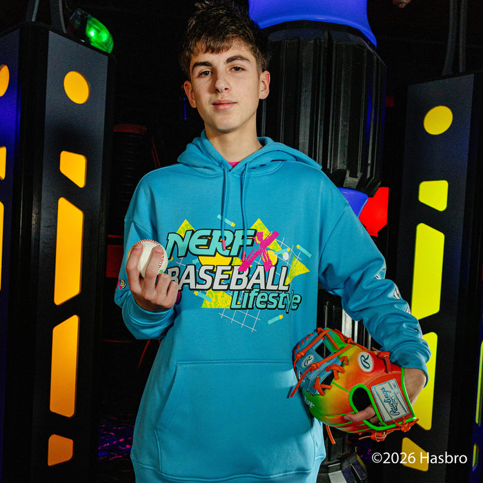Person wearing a blue hoodie with 'NERF Baseball Lifestyle' text, holding a baseball and glove in front of colorful background.