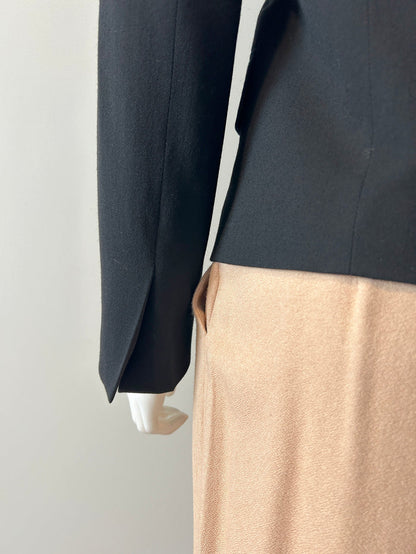 Ann Demeulemeester black two-way blazer in size 34/2, tailored fit, with classic lapels and sleek design, on a hanger.