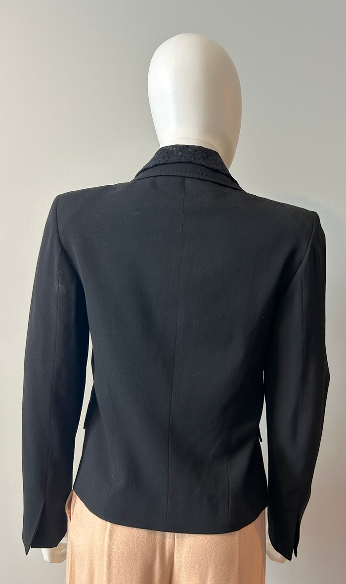 Black Ann Demeulemeester 2-way blazer in size 34/2, tailored fit, stylish women's clothing, shown on a hanger.
