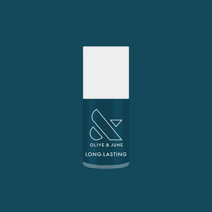Après Mani deep teal green gel polish bottle by Olive and June for quick dry, long-lasting at home manicure polish