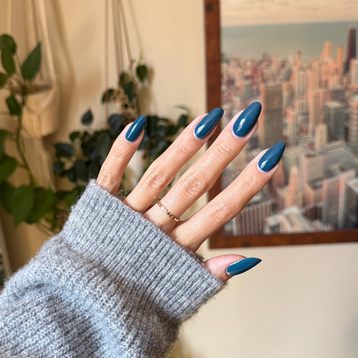 Après Mani deep teal green gel polish on almond-shaped nails for a smooth, long-lasting at-home manicure by Olive and June
