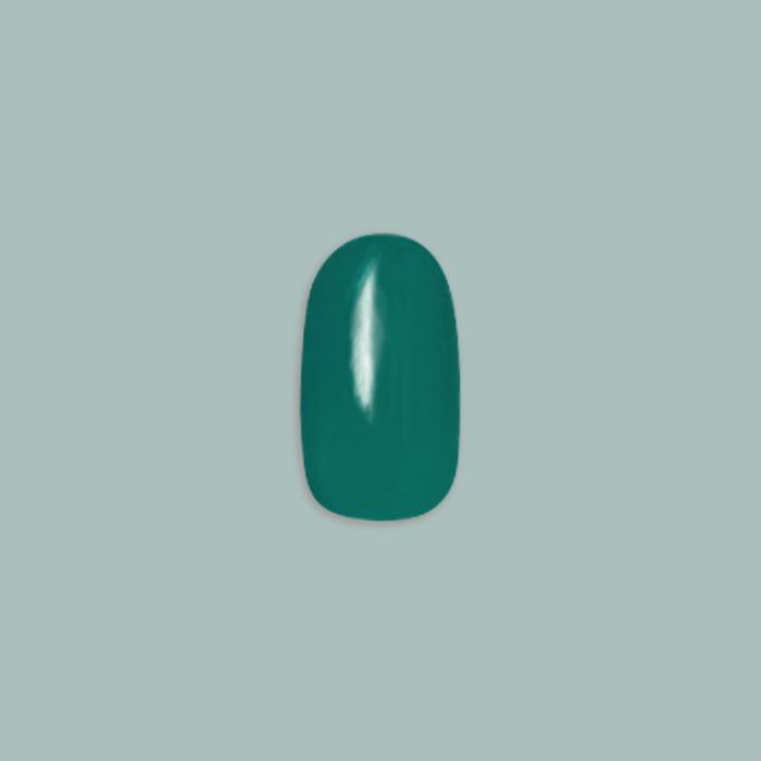 Besties - Press-On | Short | Round showing single deep emerald green short round false nail on muted teal background