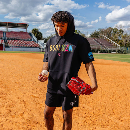 Adult model wearing black and midnight sundae BSBL-SZN short sleeve hoodie