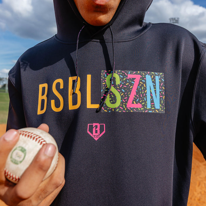 Adult model wearing black and midnight sundae BSBL-SZN short sleeve hoodie