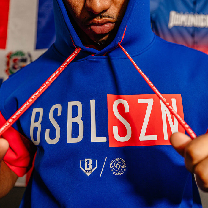 Adult model wearing navy BSBL-SZN Dominican Republic short sleeve hoodie