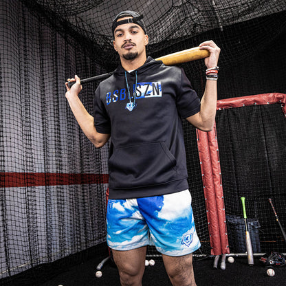 Adult model wearing blue BSBL-SZN Dream Chaser short sleeve hoodie