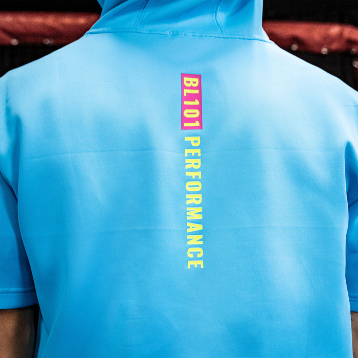 Youth model wearing blue BSBL-SZN Highlighter Blue youth short sleeve hoodie