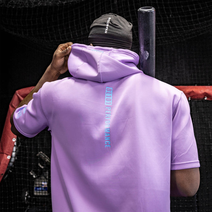 Adult model wearing lavender and light blue BSBL-SZN short sleeve hoodie