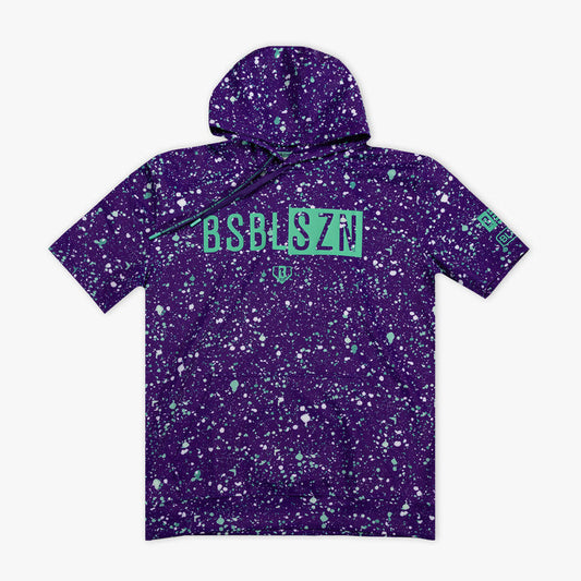 Purple splatter-patterned hoodie with green 'BSBL SZN' text on a white background