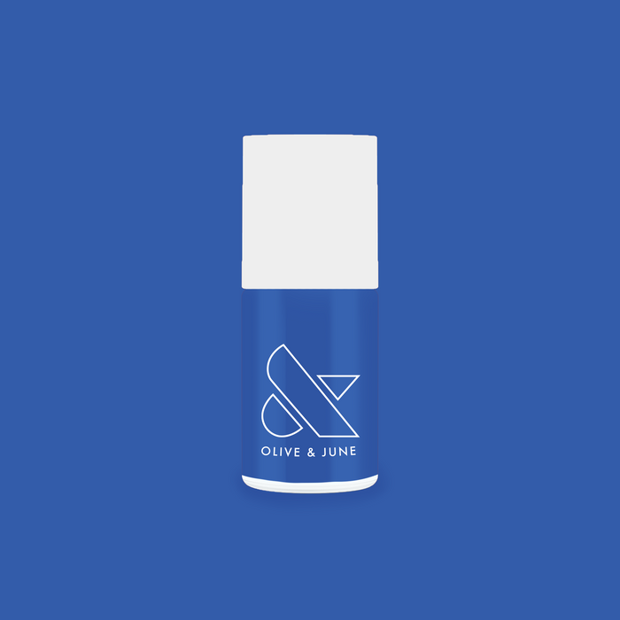 Can’t Lose nail polish bottle in bright jersey blue for a smooth, long-lasting at-home manicure by Olive and June