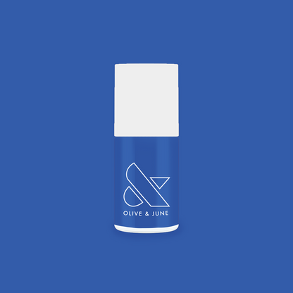 Can’t Lose nail polish bottle in bright jersey blue for a smooth, long-lasting at-home manicure by Olive and June