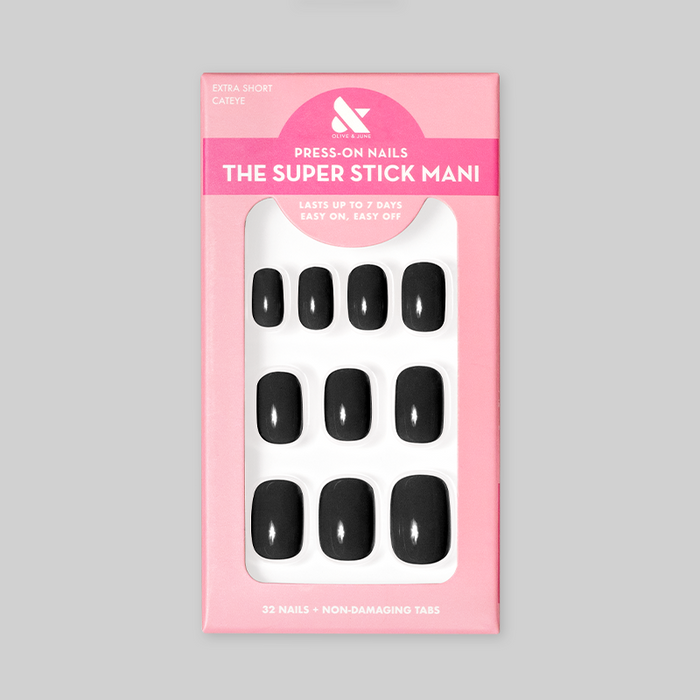Cateye | Extra Short | Squoval - Tab Press-On nails in glossy solid black displayed in pink packaging with 32 nails and non-damaging tabs