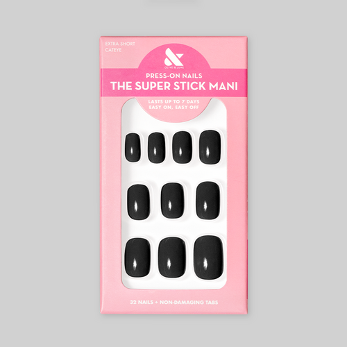 Cateye | Extra Short | Squoval - Tab Press-On nails in glossy solid black displayed in pink packaging with 32 nails and non-damaging tabs