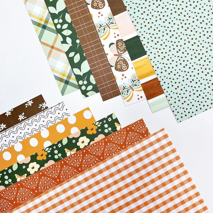 Catherine Pooler - 12x12 Patterned Paper - Free Spirit. The Free Spirit Patterned Paper features 12 patterns and prints with butterfly, floral and abstract texture papers. Available at Embellish Away located in Bowmanville Ontario Canada.