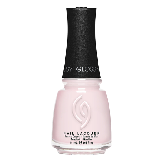 43110 China Glaze Glowing Petals 14ml Nail Polish | Glossy nail polish bottle with light pink nail varnish and a black cap on a white background