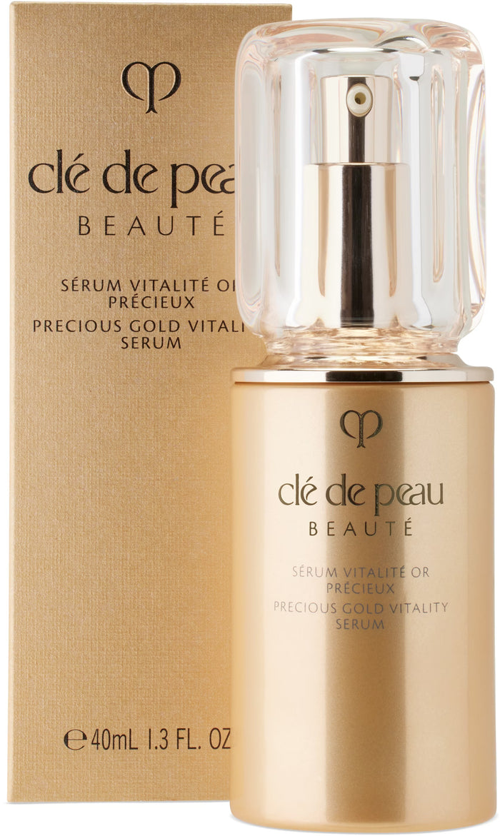 Clé de Peau Beauté Precious Gold Vitality Serum 40 mL bottle, luxurious skincare product with gold accents and elegant packaging.