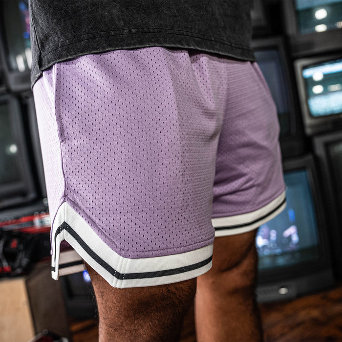 Adult model wearing purple Court Lavender shorts