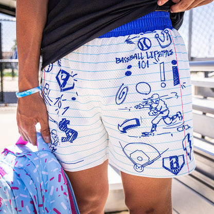 Adult model wearing white shorts with “Doodle” design