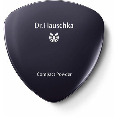 Dr. Hauschka compact powder in shade 00, natural beauty cosmetic with pressed face powder, showing the closed compact case.