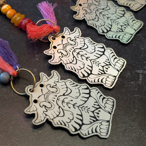 EFFIGY LEATHERETTE CHARM- GLOW OR RAINBOW SILVER