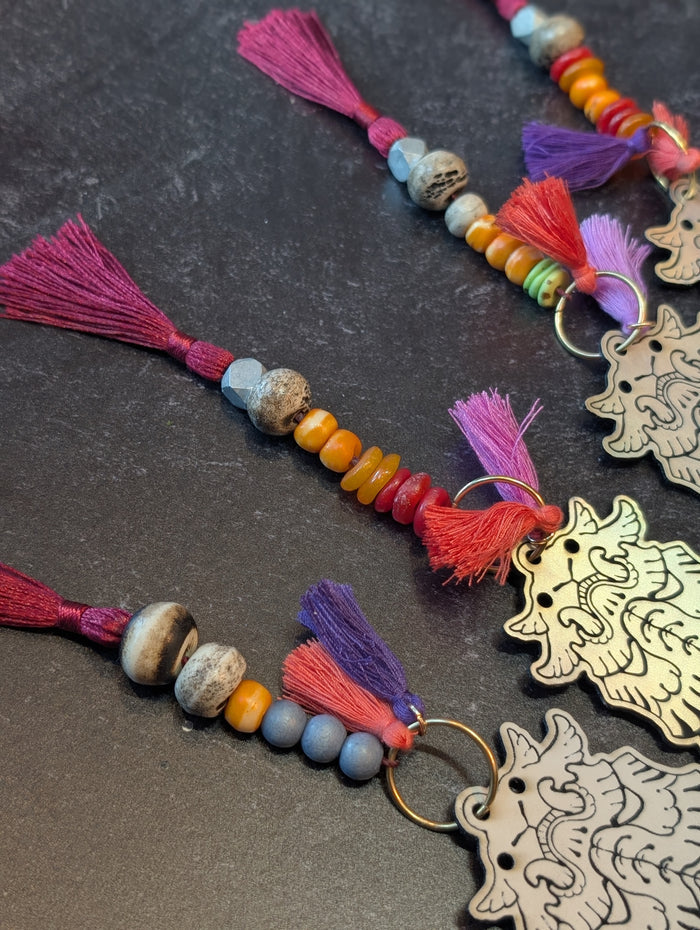 EFFIGY LEATHERETTE CHARM- GLOW OR RAINBOW SILVER