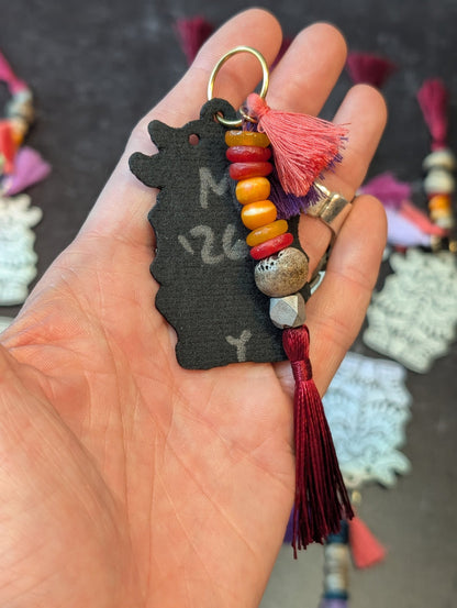 EFFIGY LEATHERETTE CHARM- GLOW OR RAINBOW SILVER