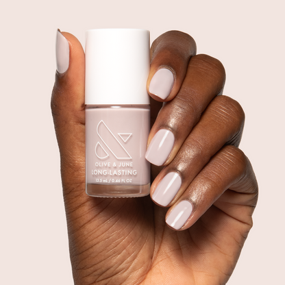 Extra Marshmallows gel polish on medium-length nails showing a sheer grey lavender manicure by Olive and June