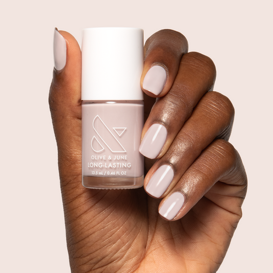 Extra Marshmallows gel polish on medium-length nails showing a sheer grey lavender manicure by Olive and June