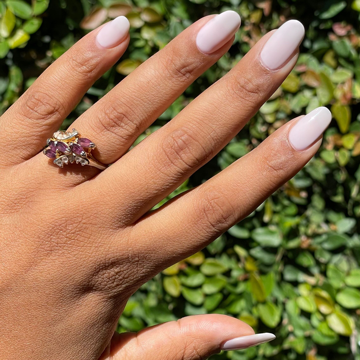 Extra Marshmallows gel polish on natural nails showing a sheer soft cool toned manicure by Olive and June