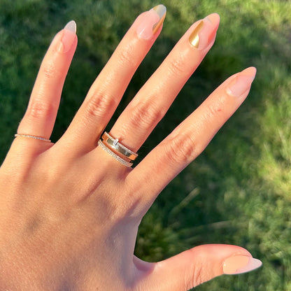 Fall Groovy Swirl - Press-On | Medium | Almond nails with peach base and single gold accent nail on natural hand outdoors