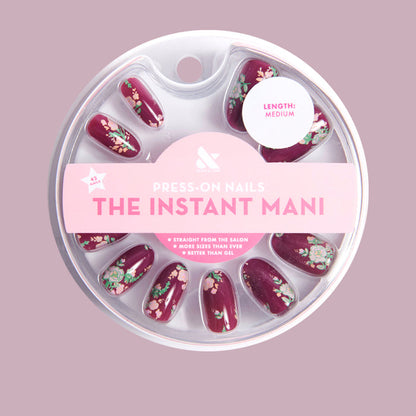 Fall Micro Floral | Oval | Medium press-on nails with a rich berry base and delicate fall floral designs for easy at-home mani