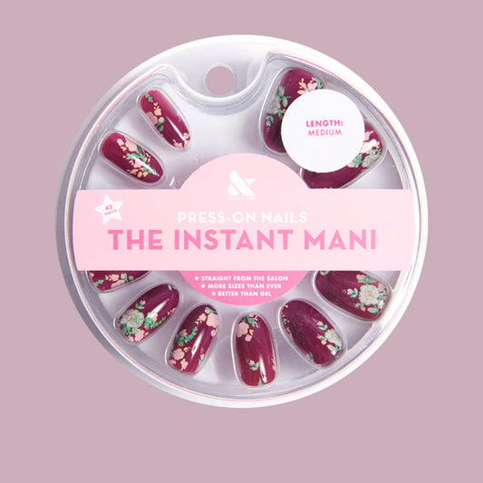 Fall Micro Floral | Oval | Medium press-on nails with a rich berry base and delicate fall floral designs for easy at-home mani