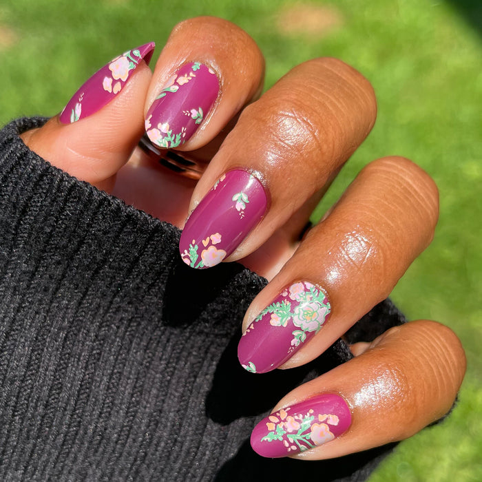Fall Micro Floral | Oval | Medium press-on nails featuring a vibrant berry base with delicate floral accents for a stylish at-home mani