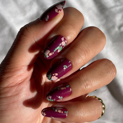 Fall Micro Floral | Oval | Medium press-on nails with a deep berry base and delicate floral details for easy at-home mani