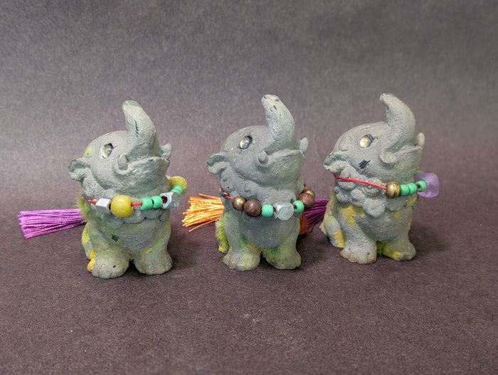 FAUX STONE BAKU FIGURINE