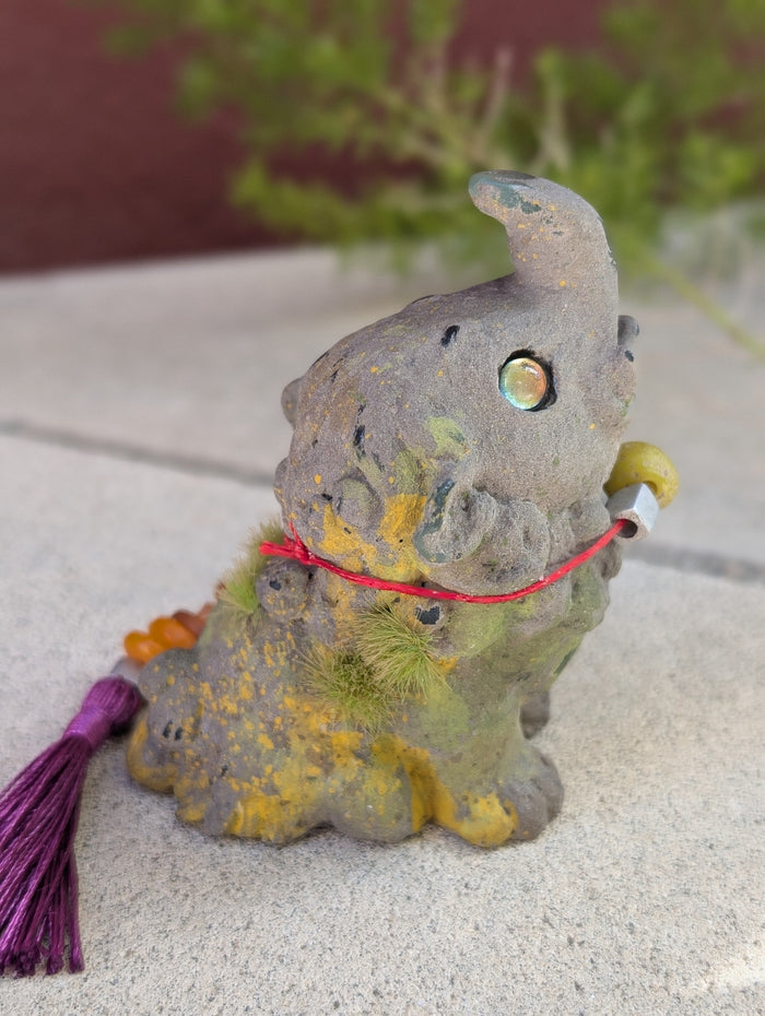 FAUX STONE BAKU FIGURINE