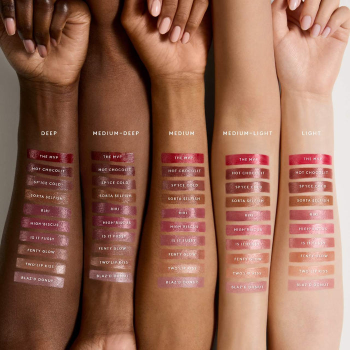 Fenty Beauty Gloss Bomb Stix high-shine gloss sticks in various shades, featuring vibrant colors and sleek packaging.