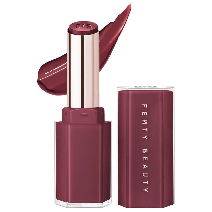 Fenty Beauty Gloss Bomb Stix high-shine gloss stick in various shades, featuring a sleek, portable lip gloss product.