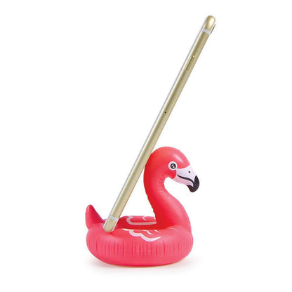 Fred & Friends Float on flamingo phone stand with pink flamingo design holding a smartphone.
