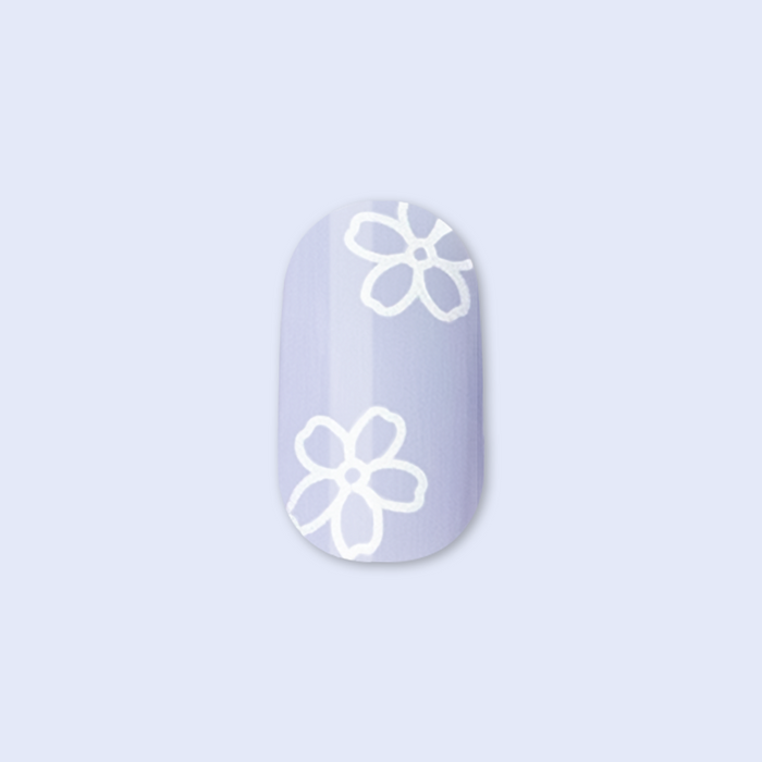 Floral Doodle | Short | Round - Tab Press-On nail with pastel blue base and white floral design for a fresh mani look