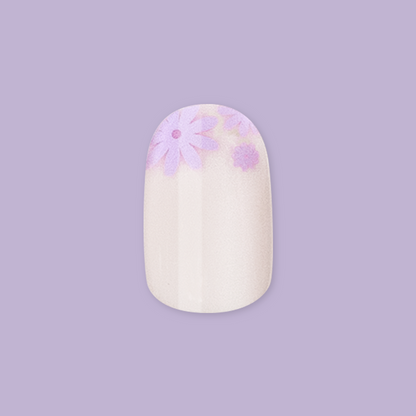Floral Tip | Short | Round - Tab Press-On with soft neutral base and delicate lavender flower accents at the tip