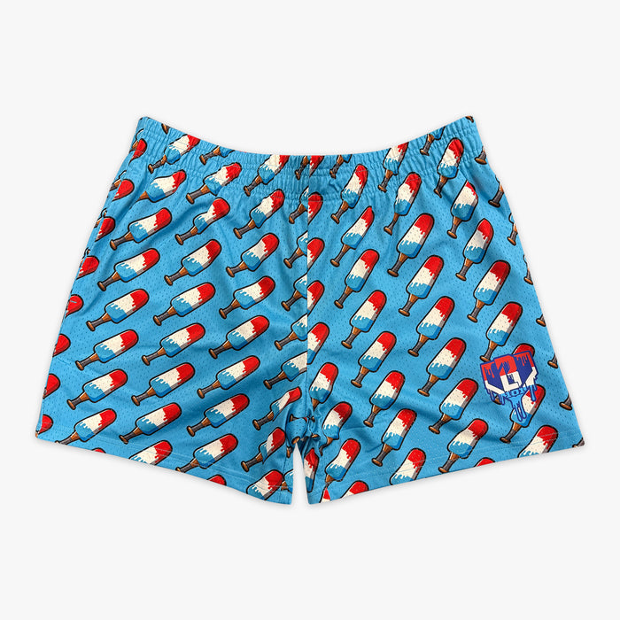 Adult model wearing blue shorts with “Freeze Pop” design