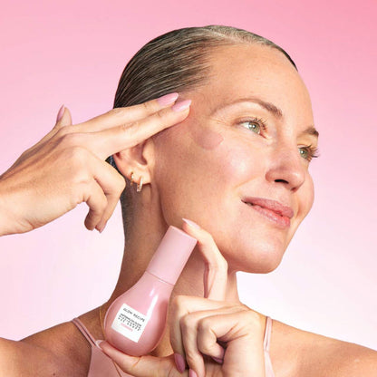 Glow Recipe Watermelon Glow Niacinamide Hue Drops serum with rosy tint, displayed in a 40ml bottle, close-up view.