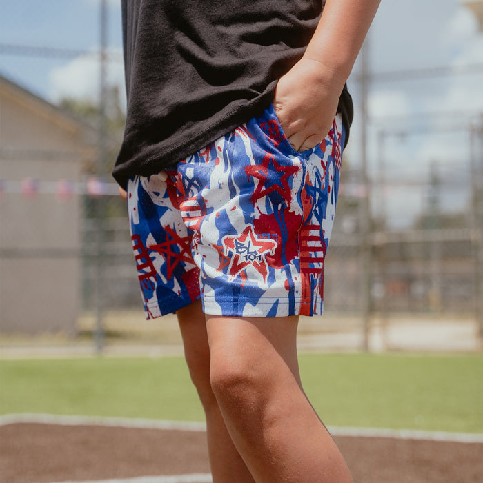 Youth model wearing graffiti Stars USA youth shorts