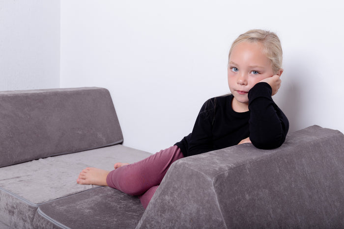 Rose brown grow-with-me pants for toddlers and kids, made from soft, eco-friendly fabric. Adjustable waistband and cuffs for extended wear. Ethically made in Canada.